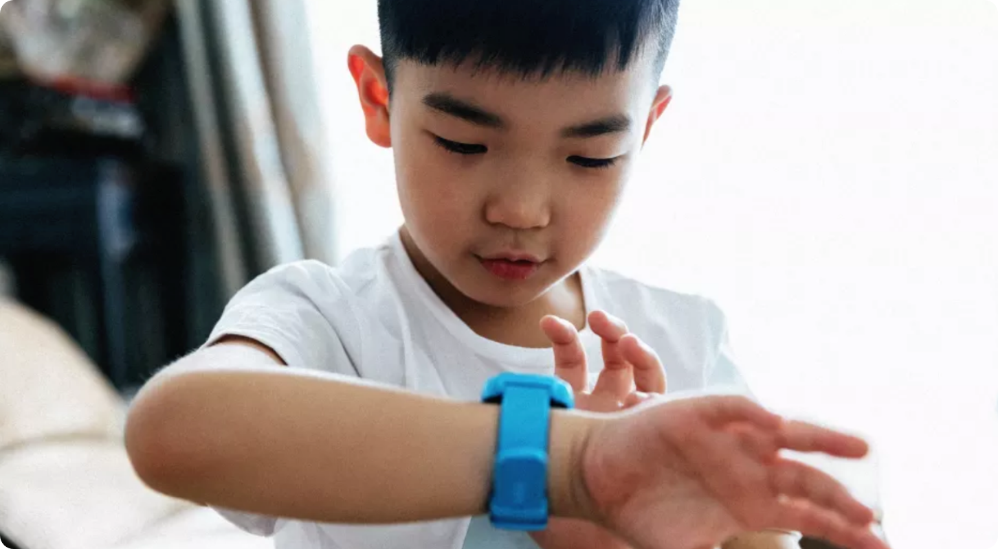 kid with watch